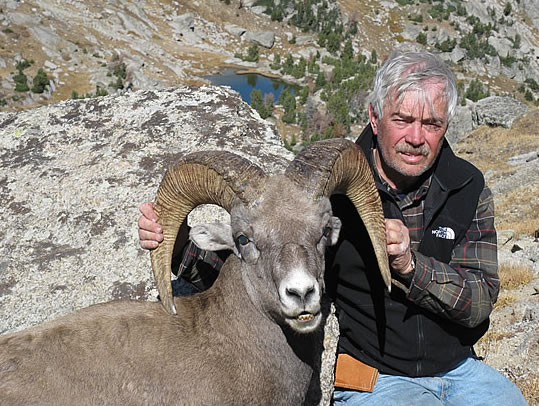 Hunter with Shiras Moose in Wind River Mountains of Wyoming